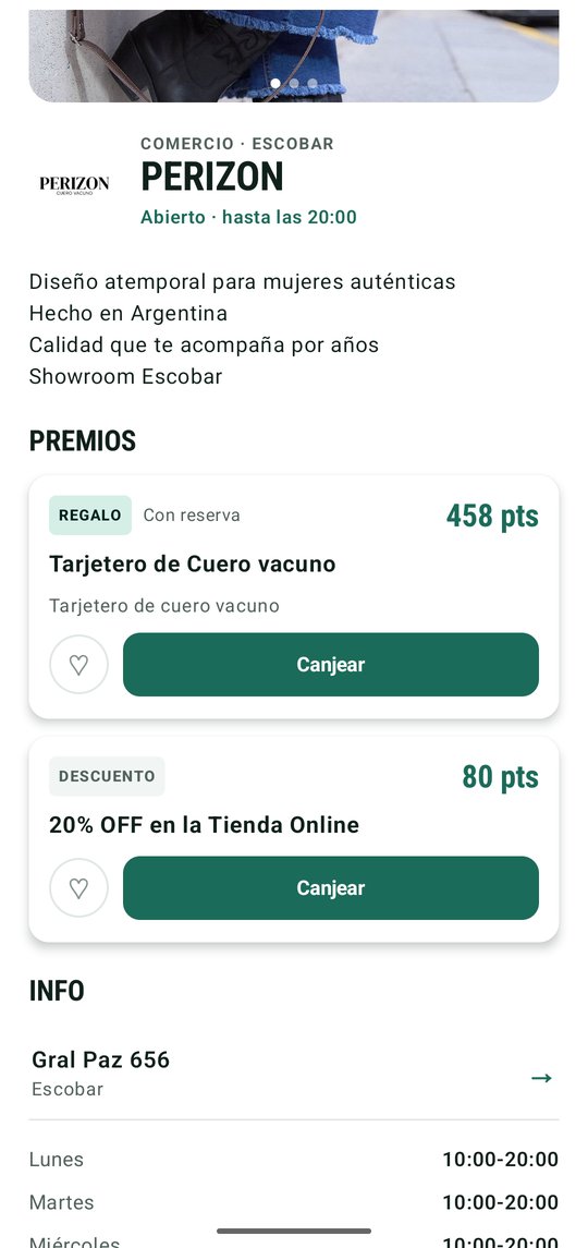 Ficha de un negocio en Desenchufe con sus premios: un regalo y un descuento, con el botón Canjear